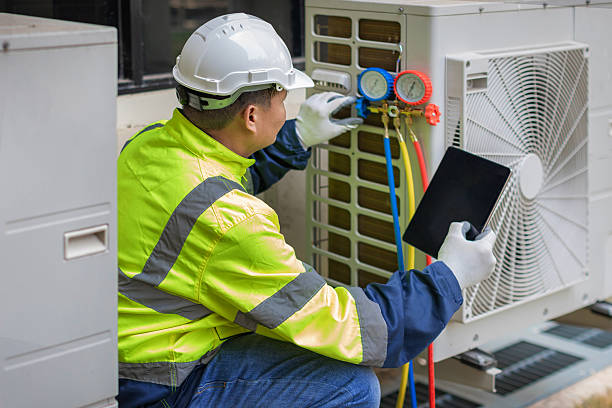 Professional Hvac technician working in Highland, KS